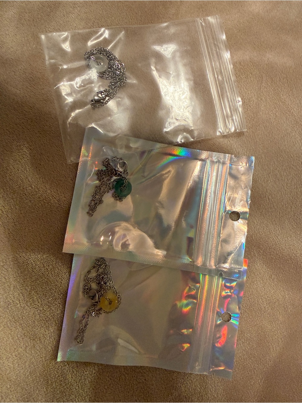 3 Necklace with different colour pendants